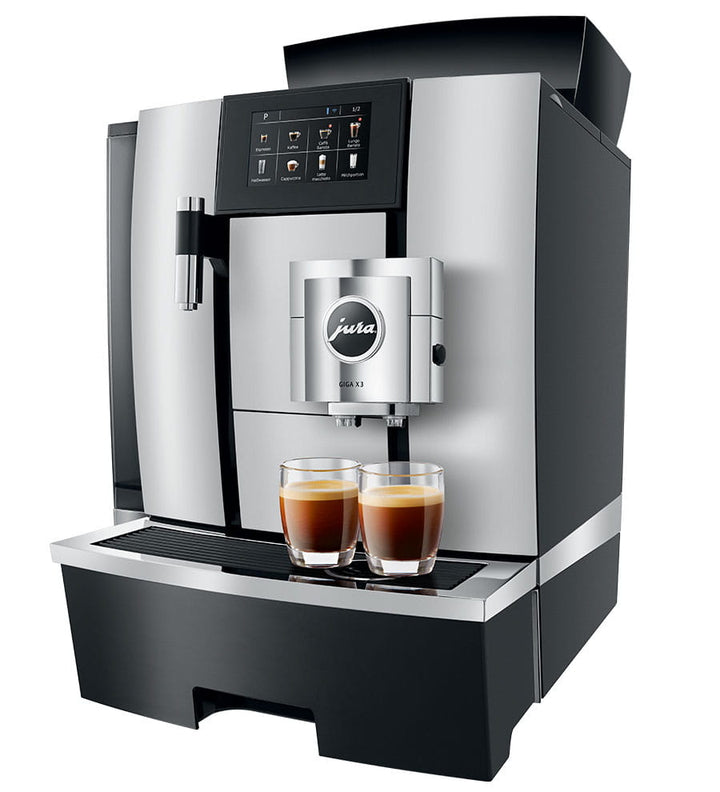 Jura Giga X3 bean-to-cup coffee machine brewing two espressos – premium automatic coffee solution for offices and hospitality settings.