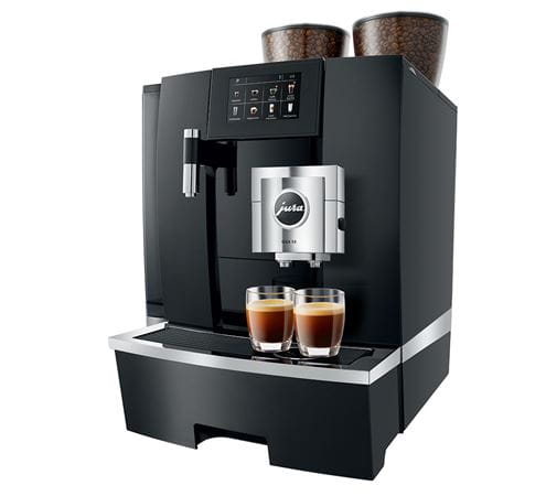 Jura Giga X8 bean-to-cup coffee machine with dual spouts brewing two espressos — commercial-grade design with twin bean hoppers and touch display.