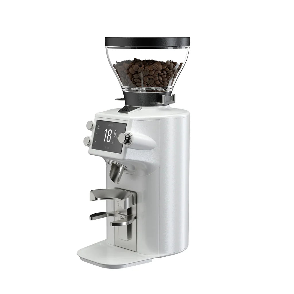 White coffee grinder with digital display and glass container of coffee beans on a white background